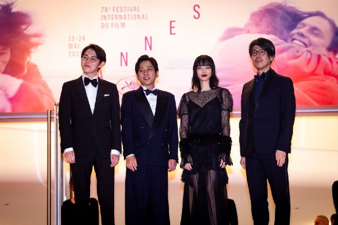 The Exit 8 team walks the red carpet at the 78th Cannes Film Festival